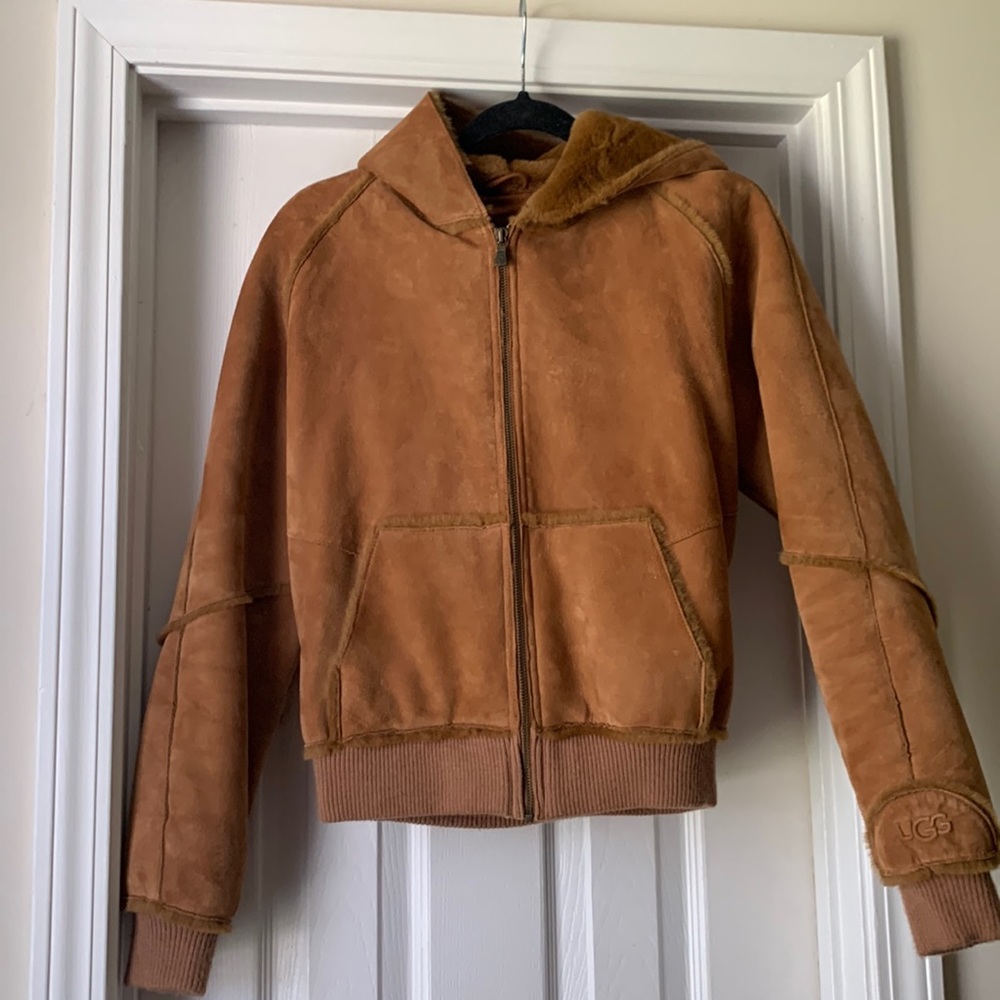 UGG women’s jacket with a hood. Size large. However runs small.